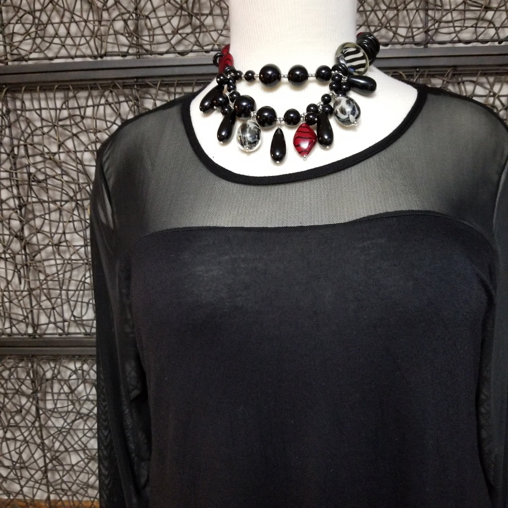 Black top with sheer shoulders and arms